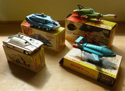 Lot 255 - Four Boxed Dinky Gerry Anderson TV Series Vehicles:- Thunderbirds 2 & 4 No.101, with inner...