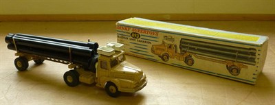 Lot 272 - A Boxed French Dinky Supertoys Unic Sahara Pipe Transporter No.893, with beige body, white...