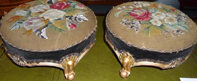 Lot 1430 - A Pair of Victorian Giltwood Footstools, upholstered in old needlework and chenille fabric, the...