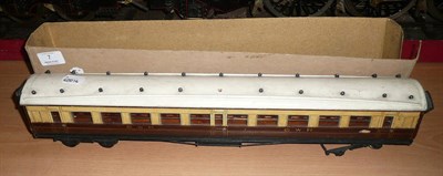 Lot 7 - A Wooden 'O' Gauge Third Class Bogie Carriage, in GWR brown and cream livery, with white roof,...