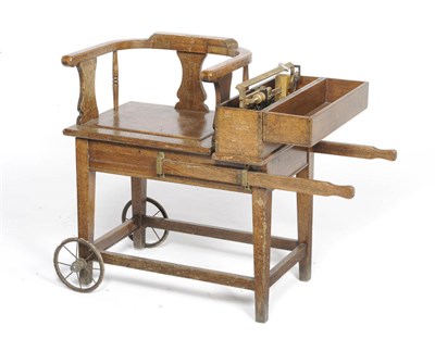 Lot 1435 - An Oak Jockey Scale, by Allen & Hanburys Ltd, London, circa 1890, the U arms over a solid seat,...