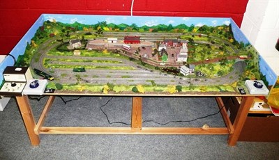 Lot 51 - A Fully Operational 'N' Gauge Train Layout, set up for use by two trains, with seperate power...