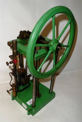 Lot 56 - A Single Cylinder Stationary Steam Engine, in brass and steel, painted green, with large spoked...