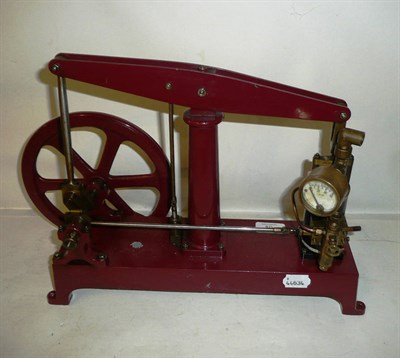 Lot 59 - A Single Cylinder Live Steam Beam Engine, painted in maroon, with large pierced flywheel,...