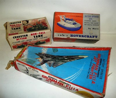 Lot 65 - Three Boxed Battery Operated Vehicles:- Marx SRN 5 Hovercraft, in cream, silver and blue...