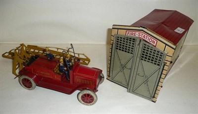 Lot 68 - A German Clockwork Tinplate Fire Engine and Fire Station by Johann Distler, with 'JDN'...