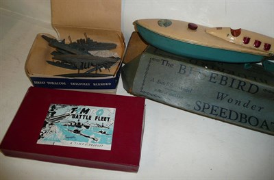 Lot 76 - A Boxed Sutcliffe Clockwork Tinplate Bluebird Wonder Speedboat, early version with blue hull, cream