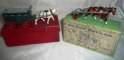 Lot 80 - A Boxed Britains 'Home Farm Series' Lead Horse Roller No.9F, with a brown horse, grey and brown...