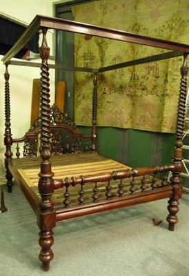 Lot 1454 - An Impressive Colonial Hardwood Four Poster Bed, the headboard with moulded top rail with...