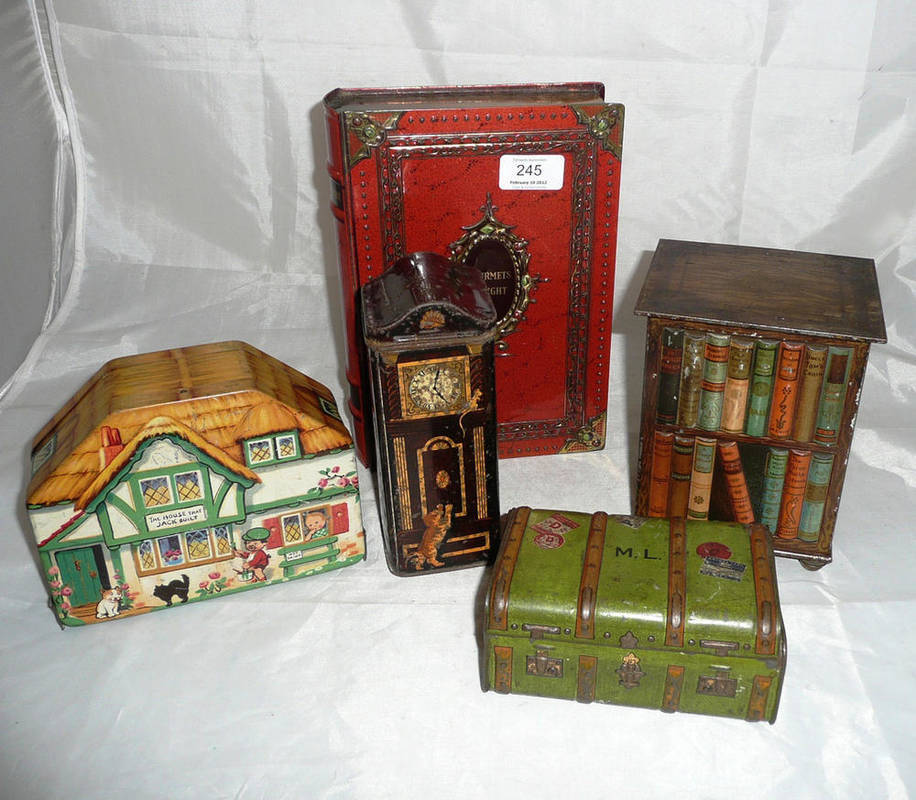 Lot 245 - Five Novelty Biscuit Tins - Huntley & Palmers Bookcase, Peak Freen Hickory Dickory Dock Clock,...