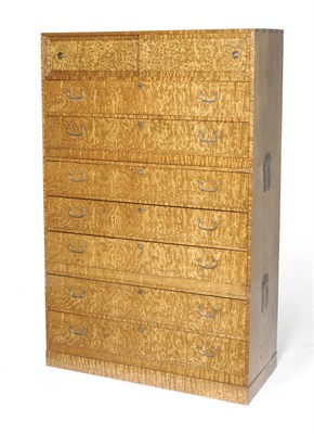 Lot 1460 - A Japanese Burr Ash Kimono Chest, circa 1920, in three parts, the upper section with two...