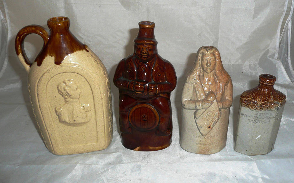 Lot 259 - Four Stoneware Spirit Flasks:-  saltglazed 'Brougham Reform Cordial' flask; saltglazed flask...