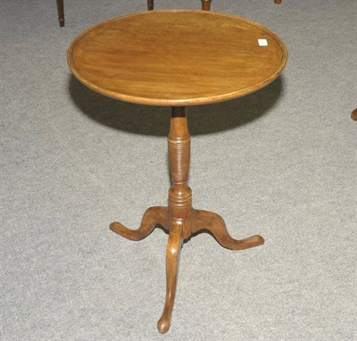 Lot 1472 - A 19th Century Mahogany Flip-Top Pedestal Table, the circular ring turned top raised on a...