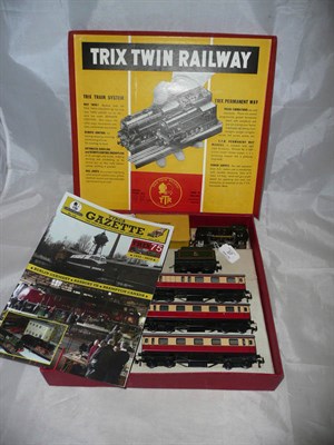 Lot 37 - A Boxed Trix Twin Railway 'OO' Gauge Electric Passenger Set, containing 0-4-0 locomotive and tender