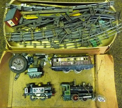 Lot 41 - A Case of 'O' Gauge Trains and Accessories, including a German spirit fired 0-4-0 locomotive, a...