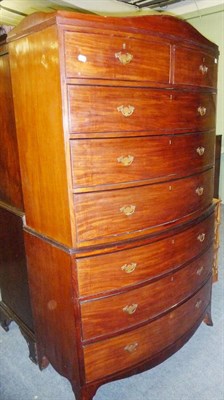 Lot 1474 - A Regency Mahogany Bowfront Chest on Chest, the serpentine shaped top with reeded moulding...