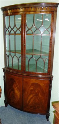 Lot 1476 - A Mahogany Bowfront Corner Cabinet, circa 1900, the egg and dart moulded frieze above two...