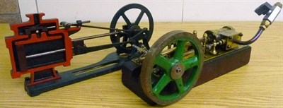 Lot 81 - A Gas Powered Horizontal Brass Stationary Engine, with single cylinder, spoked green flywheel,...