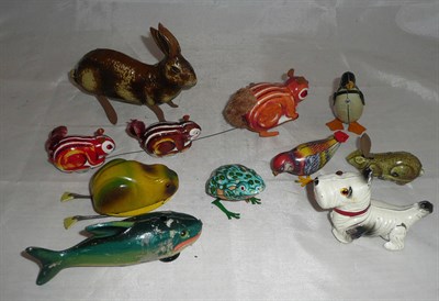 Lot 105 - Eight Clockwork Tinplate Animals, comprising, Rabbit & Hare, Shark, Penguin, two Frogs,...