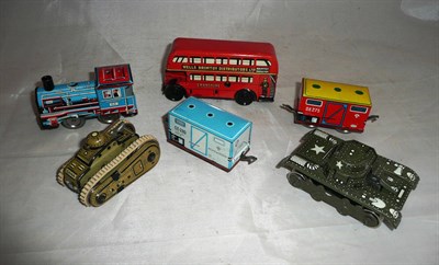 Lot 106 - Four Small Clockwork Tinplate Vehicles - Wells Pocketoys Bus, US Zone Germany Tank, Gama Tank...