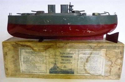 Lot 113 - A Boxed Sutcliffe Spirit Fired Model Warship, with grey deck and superstructure, red lower hull and