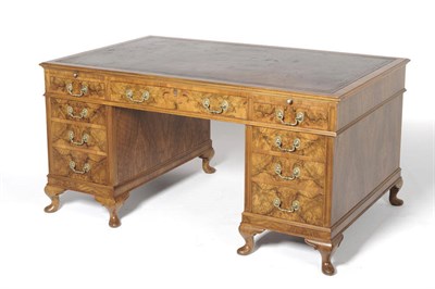 Lot 1483 - A George II Style Walnut Partner's Desk, by Beresford & Hicks, circa 1930, the rectangular top...