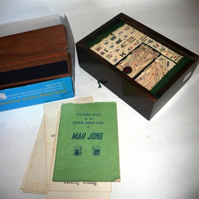 Lot 152 - A Bamboo and Bone Mah Jong Set, with instructions, in a coromandel wood box with four tile stands