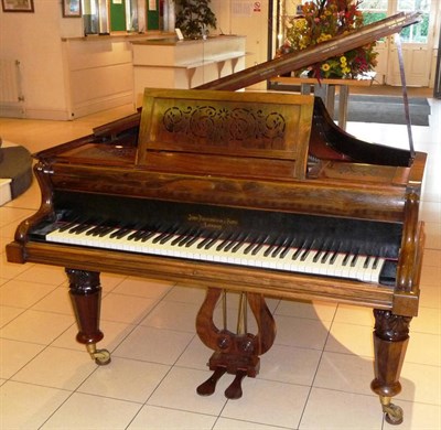 Lot 1485 - John Broadwood & Sons, circa 1890: An 8ft Grand Piano in Rosewood Case, raised on leaf carved...