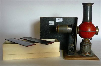 Lot 163 - A Childs 19th Century Tinplate Magic Lantern by Ernst Plank 'Laterna Magica No.657', with red...