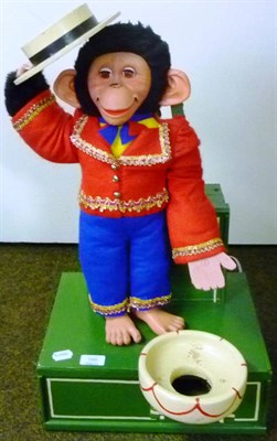 Lot 166 - An Electrically Operated Monkey Automaton Collecting Box, the rubber faced monkey dressed in...