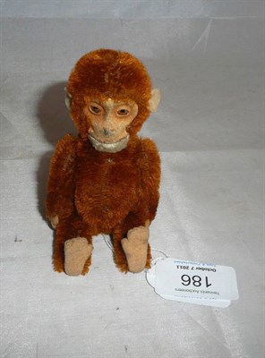 Lot 186 - A Schuco Chimpanzee Perfume Bottle, circa 1920's, with tinplate face, felt ears, hands and...