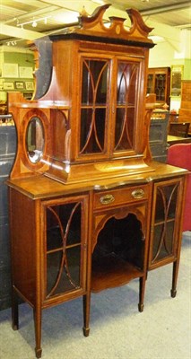 Lot 1490 - An Edwardian Mahogany and Satinwood Banded Chiffonier, the broken swan neck pediment over two...