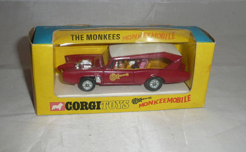 Lot 221 - A Boxed Corgi The Monkees Monkeemobile No.277, with red body, white roof, yellow logo, four...