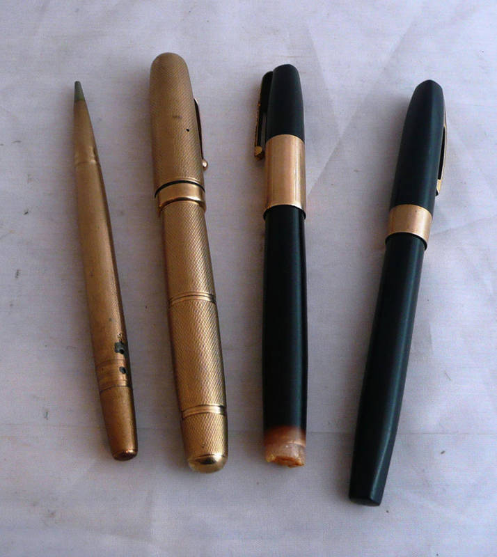 Lot 315 - A 9ct Gold Fountain Pen, with engine turned decoration, stamped 9.375 in various places,...