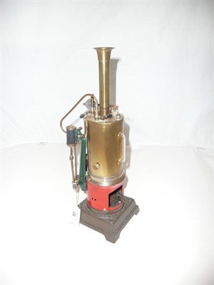 Lot 57 - A Vertical Single Cylinder Stationary Steam Engine, with brass chimney and boiler, spoked fly wheel