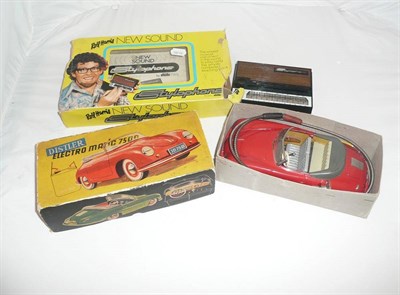 Lot 61 - A Boxed Distler Electro-Matic 7500 Porsche Cabriolet, in red tinplate, with key, steering rod...