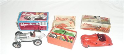Lot 62 - Three Boxed Schuco Cars:- Telesteering Car 3000, in green tinplate, with accessories; Examico 4001