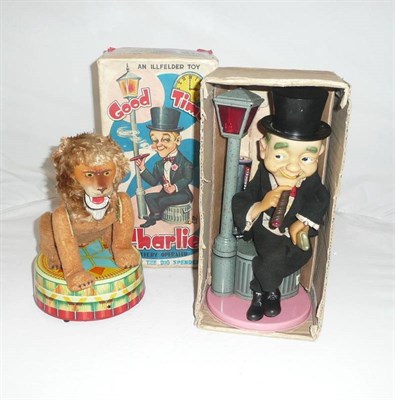 Lot 63 - Two Japanese Battery Operated Tinplate and Plastic Toys:- Good Time Charlie by Illfelder, with...