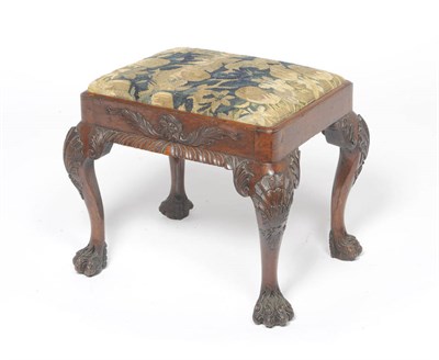 Lot 1511 - A George II Mahogany Dressing Stool, the drop-in seat upholstered in old needlework fabric, the...