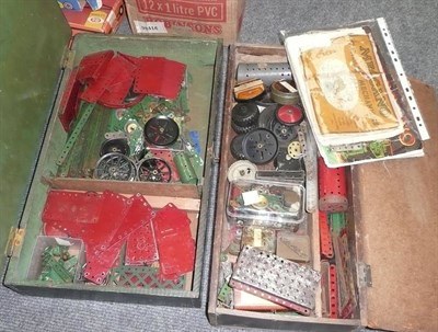 Lot 70 - A Collection of Mixed Meccano Parts, mainly red and green, also wheels, manuals etc, in two...