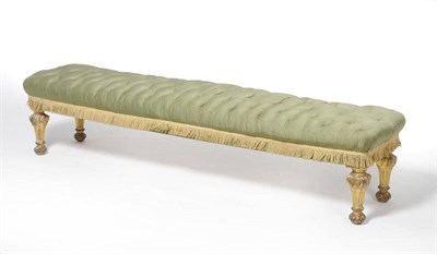 Lot 1512 - A 19th Century Gilt and Gesso Window Seat, of large proportions, upholstered in buttoned green silk