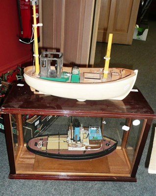 Lot 75 - A Wood and Plastic Model of a London Tug Boat 'Swim Ranger', raised on baluster turned brass...