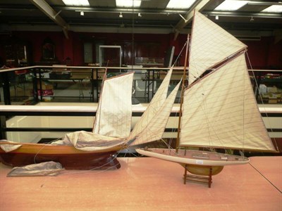 Lot 77 - Two Wooden Yachts, both with painted and varnished hulls, complete with masts and sails,...