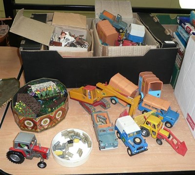 Lot 93 - A Collection of Britains Plastic Farm and Garden Figures and Accessories, including tractors,...