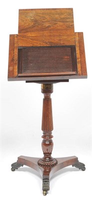 Lot 1515 - A Late Regency Rosewood Reading and Games Table, in the manner of Gillows, the hinged top with...