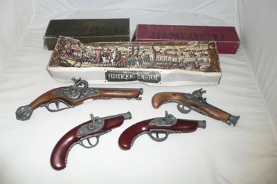 Lot 123 - Seven Replica Models of Antique Pistols, with wooden stocks and metal parts, including three in...