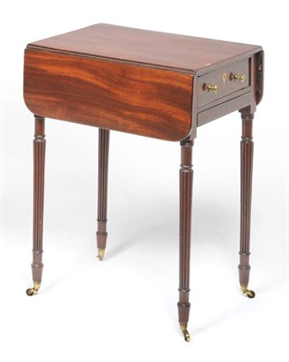 Lot 1517 - A George IV Mahogany and Ebony Strung Pembroke Table, the rectangular top with rounded drop...