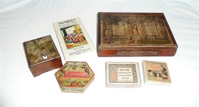 Lot 132 - Vintage Toys, comprising a hand cranked wooden musical box, a cardboard concertina, three stone...