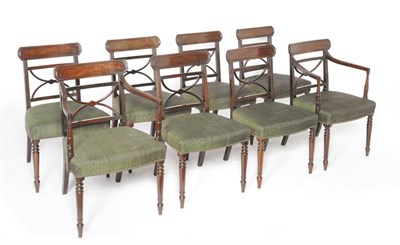 Lot 1518 - A Set of Eight Late George III Mahogany Dining Chairs, the shaped top rails above open backs...