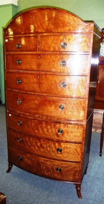 Lot 1519 - A Regency Mahogany Bowfront Chest on Chest, the domed top above two short and three long...